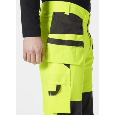 Helly Hansen Alna 4X Hi-Vis 4-Way-Stretch Construction Trousers Class 2 Yellow/Ebony Feature 3#colour_yellow-ebony