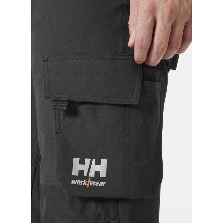 Helly Hansen Alna 4X Hi-Vis 4-Way-Stretch Work Trousers Class 1 Orange/Ebony Feature 1#colour_orange-ebony