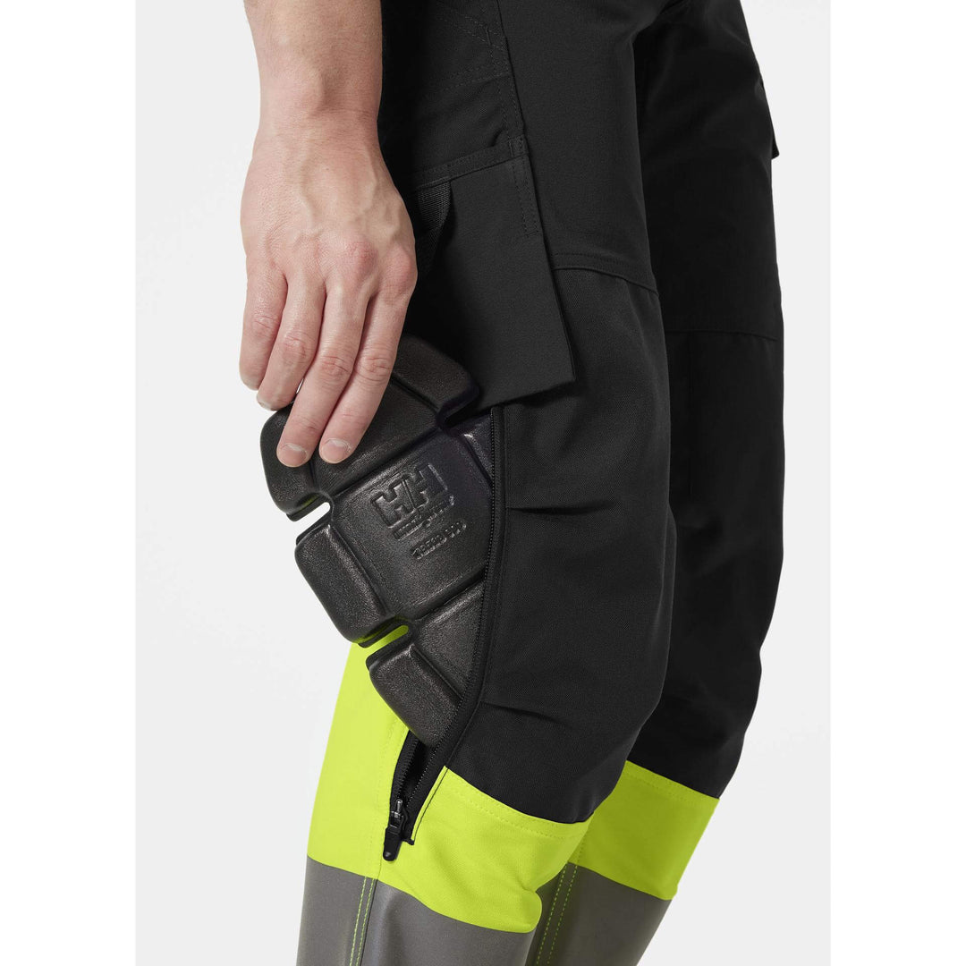 Helly Hansen Alna 4X Hi-Vis 4-Way-Stretch Work Trousers Class 1 Yellow/Ebony Feature 2#colour_yellow-ebony