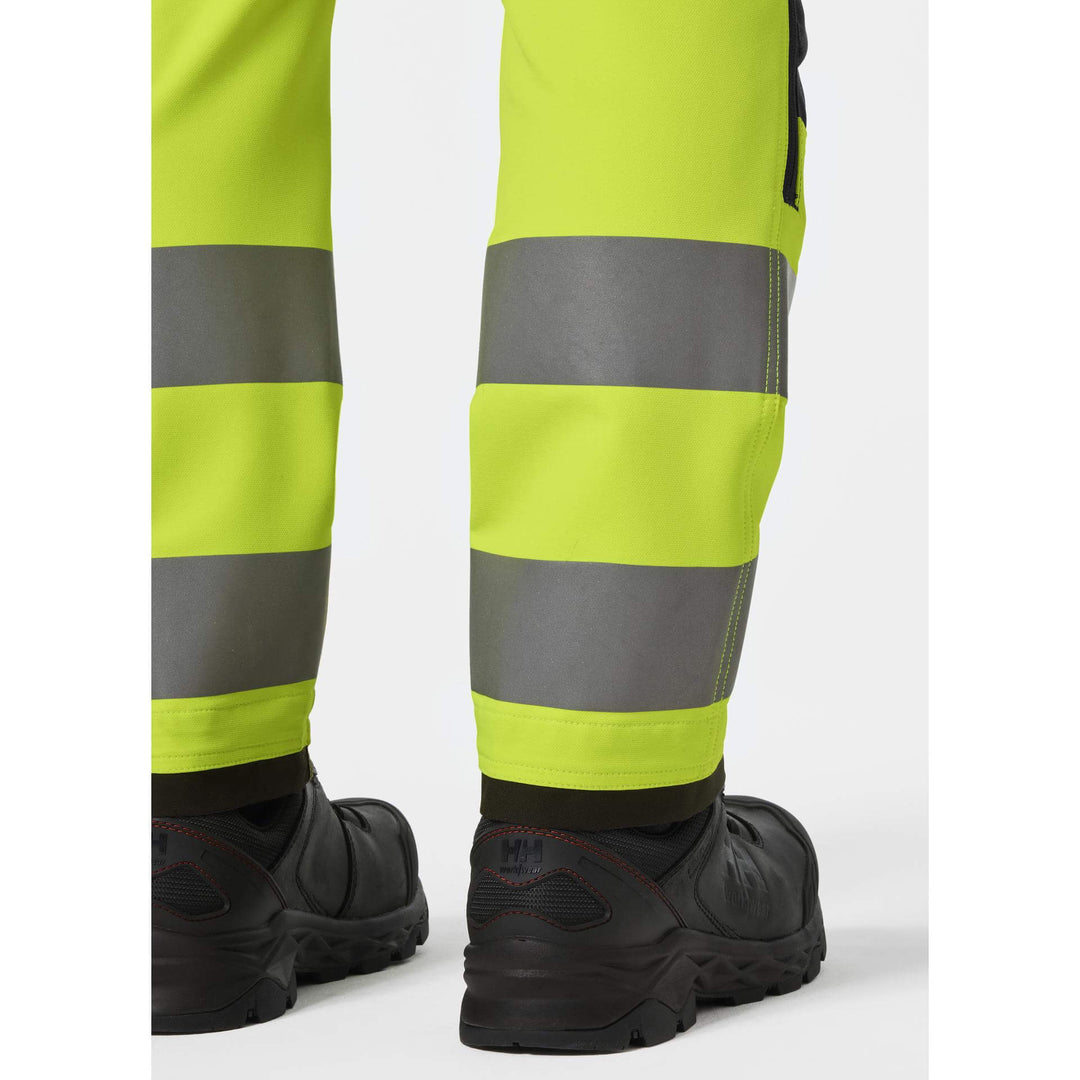 Helly Hansen Alna 4X Hi-Vis 4-Way-Stretch Work Trousers Class 1 Yellow/Ebony Feature 3#colour_yellow-ebony