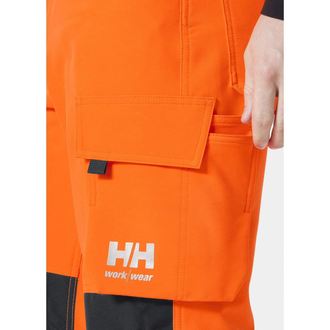 Helly Hansen Alna 4X Hi-Vis 4-Way-Stretch Work Trousers Class 2 Orange/Ebony Feature 1#colour_orange-ebony