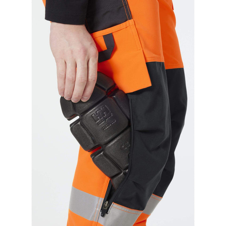 Helly Hansen Alna 4X Hi-Vis 4-Way-Stretch Work Trousers Class 2 Orange/Ebony Feature 2#colour_orange-ebony