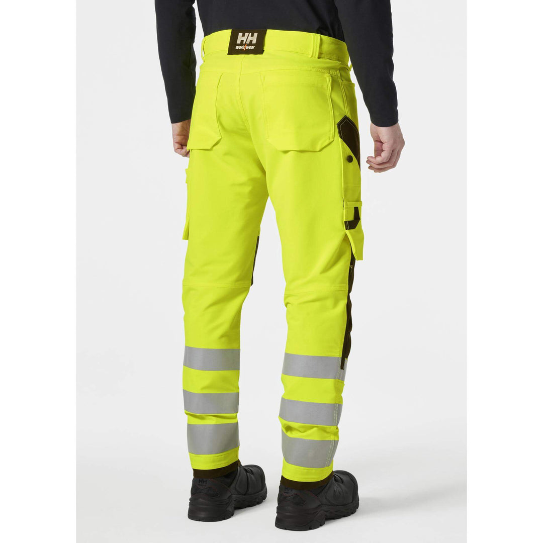 Helly Hansen Alna 4X Hi-Vis 4-Way-Stretch Work Trousers Class 2 Yellow/Ebony OnBody 2#colour_yellow-ebony