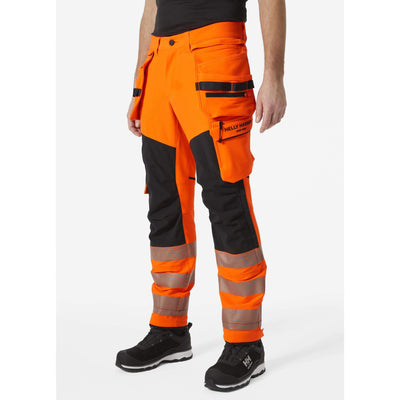 Helly Hansen ICU BRZ Hi-Vis 4-Way-Stretch Construction Trousers Class 2 Orange/Ebony OnBody 1#colour_orange-ebony