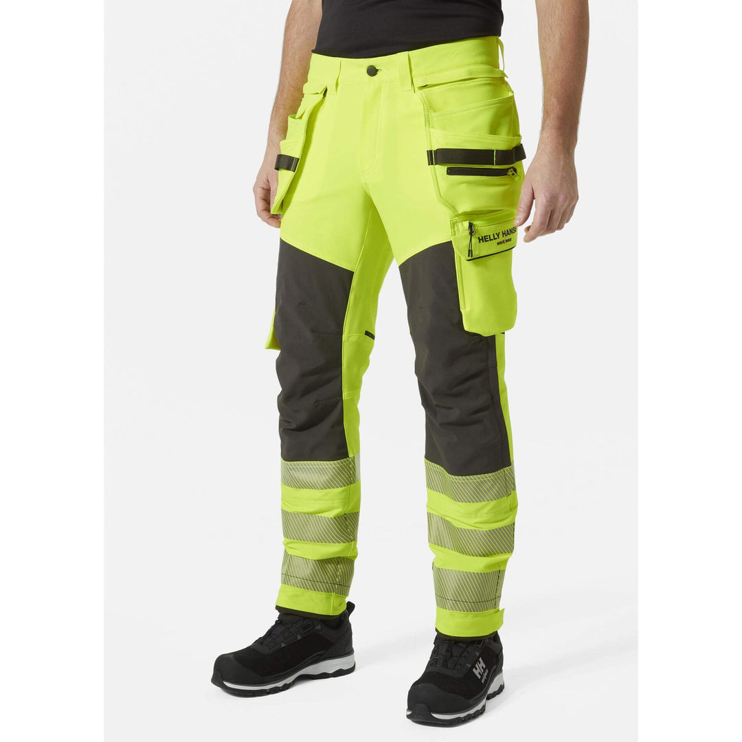 Helly Hansen ICU BRZ Hi-Vis 4-Way-Stretch Construction Trousers Class 2 Yellow/Ebony OnBody 1#colour_yellow-ebony