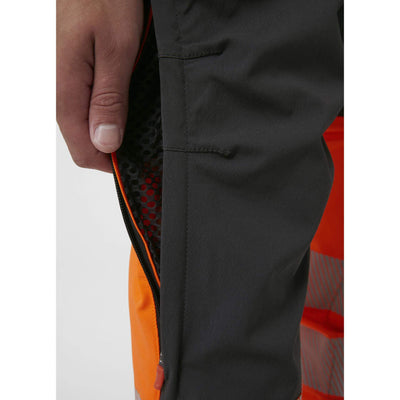 Helly Hansen ICU BRZ Hi Vis Service Work Trousers Class 1 Orange/Ebony 6 Feature 2#colour_orange-ebony