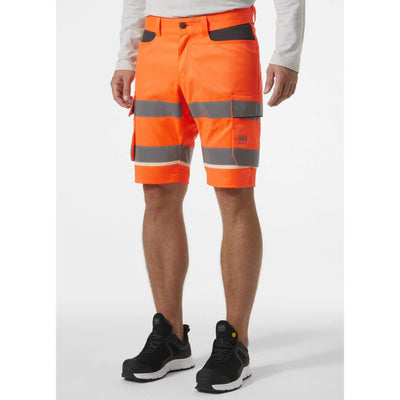 Helly Hansen UC-ME Hi-Vis Stretch Cargo Shorts Orange/Ebony OnBody 1#colour_orange-ebony