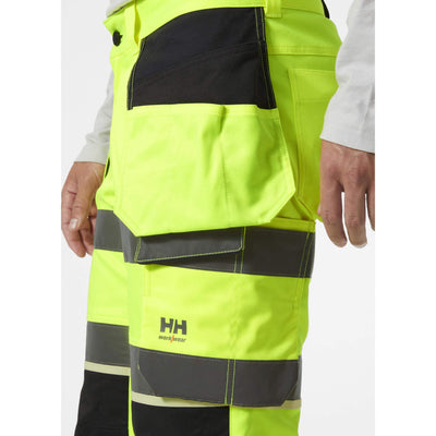 Helly Hansen UC-ME Hi-Vis Stretch Construction Pirate Trousers Yellow/Ebony Feature 2#colour_yellow-ebony