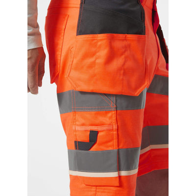 Helly Hansen UC-ME Hi-Vis Stretch Construction Shorts Orange/Ebony Feature 1#colour_orange-ebony