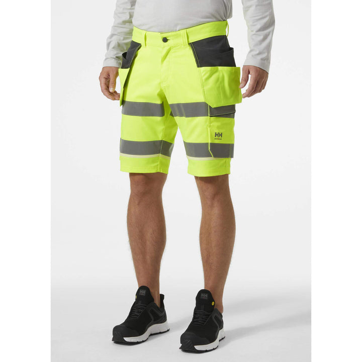 Helly Hansen UC-ME Hi-Vis Stretch Construction Shorts Yellow/Ebony OnBody 1#colour_yellow-ebony