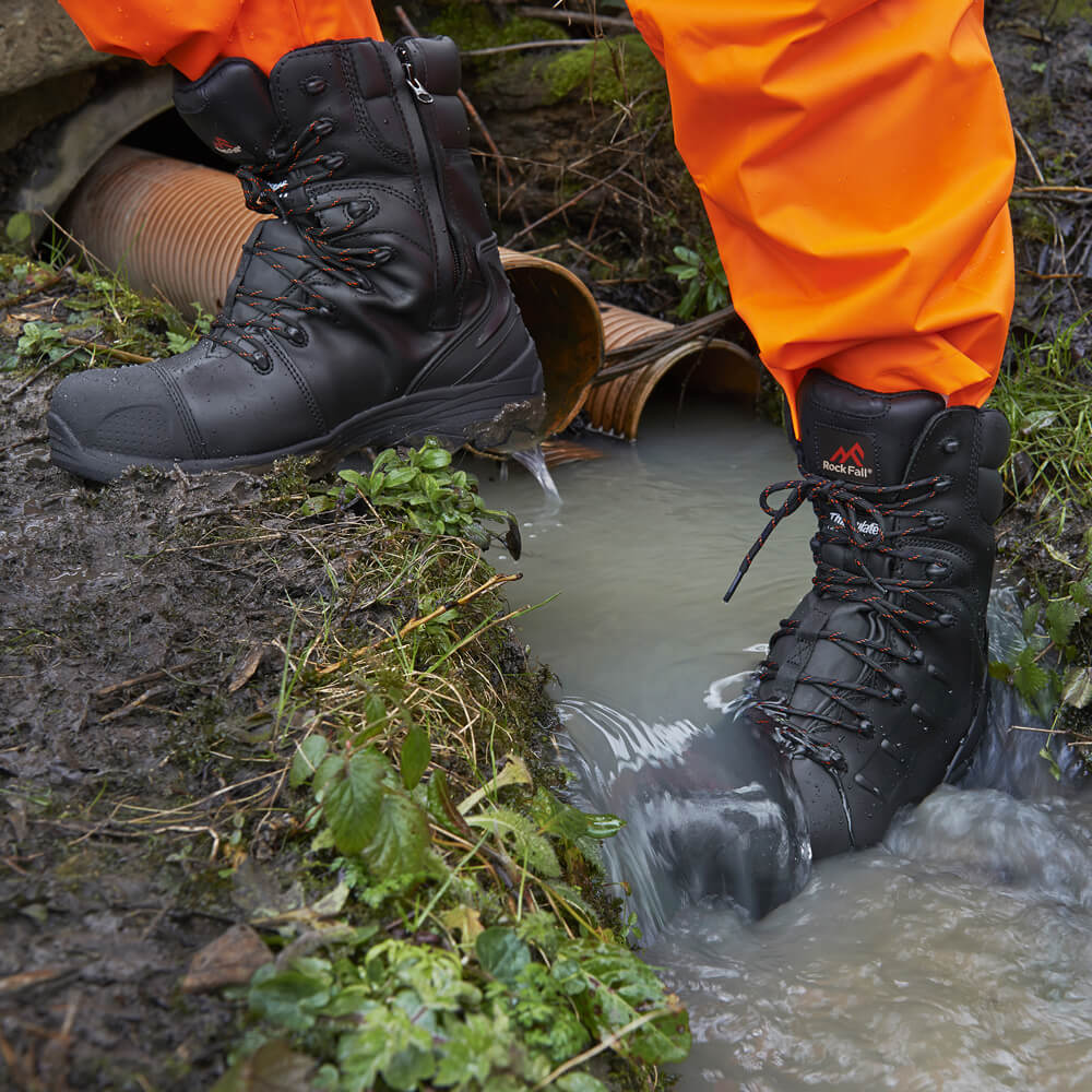 Rock Fall RF540 Monzonite Safety Boots - High Leg, Waterproof, Side Zip Black Action Shot#colour_black